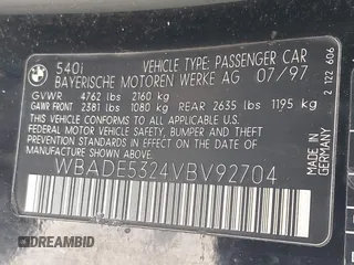 1997 BMW 5 Series 540i z VIN WBADE5324VBV92704, wystawiony jako IAAI lot #42305703 z przebiegiem 202 371 mil mil oraz . Historia ofert i sprzedaży dostępna na DreamBid. Obrazek 9.