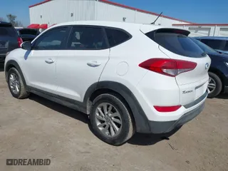 2018 Hyundai Tucson SE with VIN KM8J23A40JU669361, listed as a IAAI auction lot 41633583 with 97,884 mi miles. Bid and sale history available at carsss.com. Image 3.