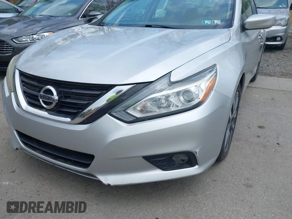 2017 Nissan Altima S z VIN 1N4AL3AP4HC288839, wystawiony jako IAAI lot #42162440 z przebiegiem 222 000 mil mil oraz . Historia ofert i sprzedaży dostępna na DreamBid. Obrazek 19.