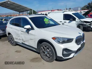 2021 BMW X1 sDrive28i with VIN WBXJG7C04M3M76473, listed as a IAAI auction lot 41720460 with 42,242 mi miles. Bid and sale history available at carsss.com. Image 1.