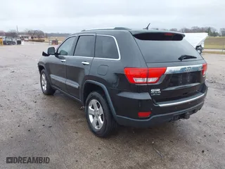 2013 Jeep Grand Cherokee Limited with VIN 1C4RJFBG4DC633137, listed as a IAAI auction lot 41235064 with 163,820 mi miles. Bid and sale history available at carsss.com. Image 3.