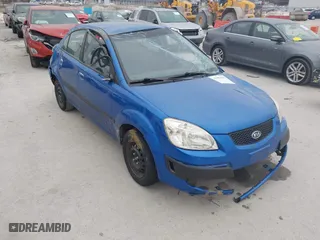 2008 Kia Rio LX with VIN KNADE123886344035, listed as a IAAI auction lot 41406033 with 229,738 mi miles. Bid and sale history available at carsss.com. Image 1.