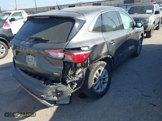 2020 Ford Escape SE with VIN 1FMCU9G63LUA52750, listed as a IAAI auction lot 40952482 with 81,070 mi miles. Bid and sale history available at carsss.com. Image 4.