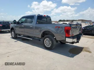 2022 Ford F-250 XL with VIN 1FT8W2BTXNEE16815, listed as a Copart auction lot 61967185 with 116,527 mi miles and Salvage title. Bid and sale history available at DreamBid. Image 2.