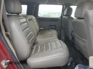 2003 Hummer H2 with VIN 5GRGN23UX3H147490, listed as a Copart auction lot 82876424 with 241,737 mi miles and Clean Title. Bid and sale history available at carsss.com. Image 11.