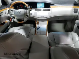2006 Toyota Avalon XL z VIN 4T1BK36B86U150304, wystawiony jako Copart lot #57402735 z przebiegiem 244 634 mil mil oraz Czysty tytuł • Clean title. Historia ofert i sprzedaży dostępna na DreamBid. Obrazek 8.