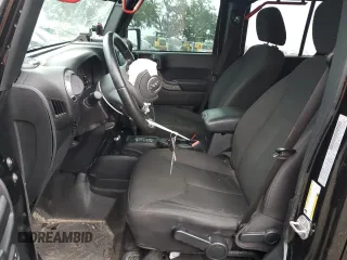2018 Jeep Wrangler JK Unlimited Sport S with VIN 1C4BJWDG0JL818800, listed as a Copart auction lot 88286715 with 114,011 mi miles and Salvage Title. Bid and sale history available at carsss.com. Image 7.