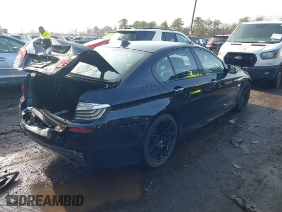 2015 BMW 5 Series 535i xDrive with VIN WBA5B3C56FD540699, listed as a IAAI auction lot 41128002 with 97,726 mi miles and . Bid and sale history available at DreamBid. Image 4.