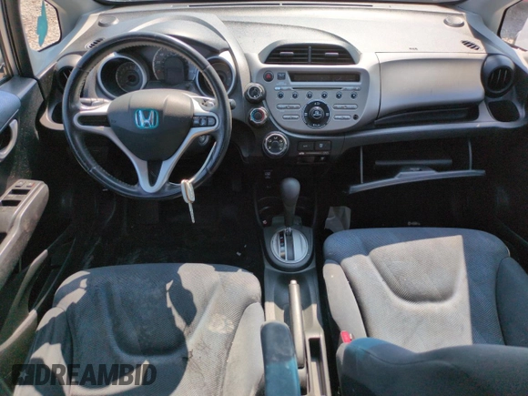 2010 Honda Fit Sport with VIN JHMGE8H41AC002070, listed as a Copart auction lot 62356565 with 148,279 mi miles and Salvage title. Bid and sale history available at DreamBid. Image 8.