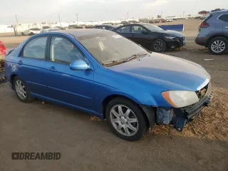 2006 Kia Spectra EX with VIN KNAFE121965262406, listed as a Copart auction lot 74614214 with 181,029 mi miles and Salvage Title. Bid and sale history available at carsss.com. Image 4.