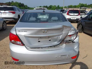 2016 Hyundai Accent SE z VIN KMHCT4AE9GU973351, wystawiony jako IAAI lot #42281546 z przebiegiem 111 130 mil mil oraz . Historia ofert i sprzedaży dostępna na DreamBid. Obrazek 16.