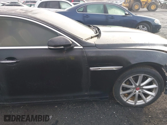 2014 Jaguar XJ with VIN SAJWA1CZXE8V74400, listed as a IAAI auction lot 38250698 with 102,205 mi miles and . Bid and sale history available at DreamBid. Image 14.