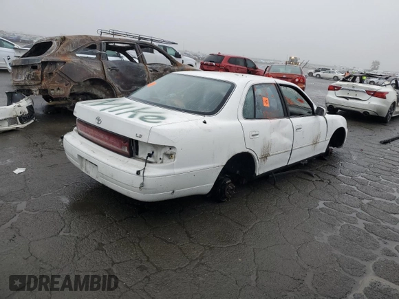 1993 Toyota Camry LE with VIN JT2SK12E0P0146094, listed as a Copart auction lot 86087964 with 0 mi miles and Salvage Title. Bid and sale history available at carsss.com. Image 3.