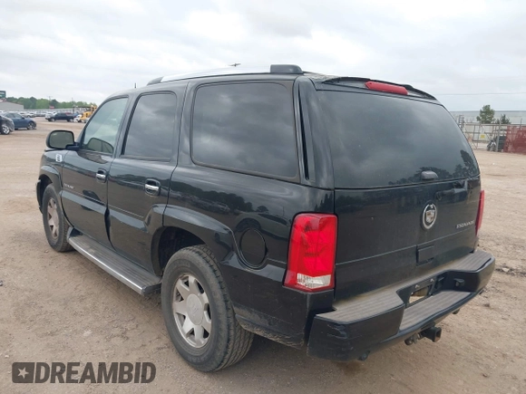 2005 Cadillac Escalade z VIN 1GYEC63TX5R203156, wystawiony jako IAAI lot #41937137 z przebiegiem 239 919 mil mil oraz . Historia ofert i sprzedaży dostępna na DreamBid. Obrazek 3.