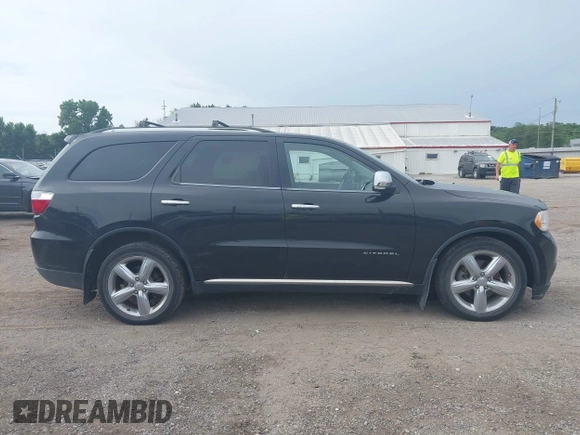 2013 Dodge Durango Citadel with VIN 1C4SDJET3DC563618, listed as a IAAI auction lot 42828144 with 202,648 mi miles and . Bid and sale history available at DreamBid. Image 13.