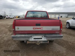1991 GMC Sierra 1500 z VIN 2GTEK19K2M1543239, wystawiony jako Copart lot #51680075 z przebiegiem 135 361 mil mil oraz Czysty tytuł • Clean title. Historia ofert i sprzedaży dostępna na DreamBid. Obrazek 6.