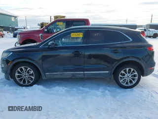 2015 Lincoln MKC with VIN 5LMTJ2AHXFUJ01440, listed as a IAAI auction lot 41526975 with 104,280 mi miles. Bid and sale history available at carsss.com. Image 14.