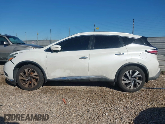 2015 Nissan Murano Platinum z VIN 5N1AZ2MG7FN265552, wystawiony jako IAAI lot #41828490 z przebiegiem 211 465 mil mil oraz . Historia ofert i sprzedaży dostępna na DreamBid. Obrazek 14.