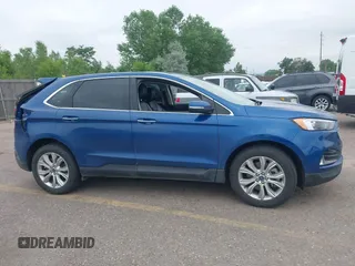 2022 Ford Edge Titanium with VIN 2FMPK4K95NBB05789, listed as a IAAI auction lot 42582372 with 58,379 mi miles and . Bid and sale history available at DreamBid. Image 13.