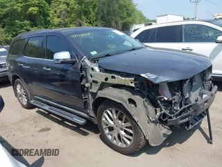 2014 Dodge Durango Citadel z VIN 1C4RDJEG8EC480656, wystawiony jako IAAI lot #42438581 z przebiegiem 182 615 mil mil oraz . Historia ofert i sprzedaży dostępna na DreamBid. Obrazek 1.
