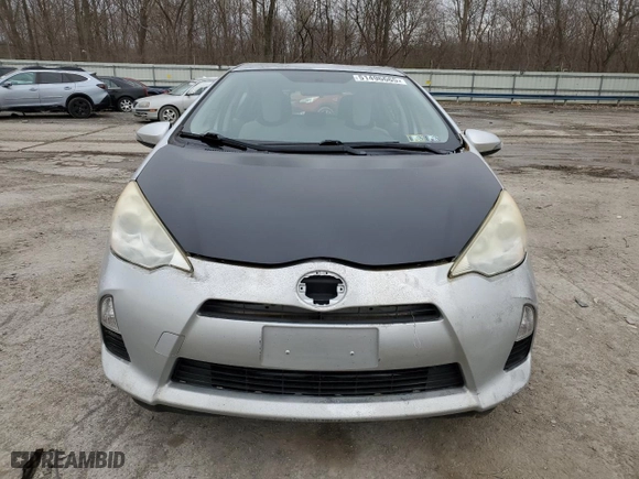 2014 Toyota Prius c One with VIN JTDKDTB31E1069156, listed as a Copart auction lot 51496665 with 133,673 mi miles and Clean Title. Bid and sale history available at carsss.com. Image 5.
