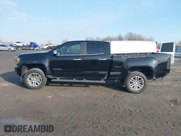 2015 GMC Canyon 4WD SLT with VIN 1GTG6CE34F1153369, listed as a IAAI auction lot 41277810 with 135,821 mi miles. Bid and sale history available at carsss.com. Image 14.