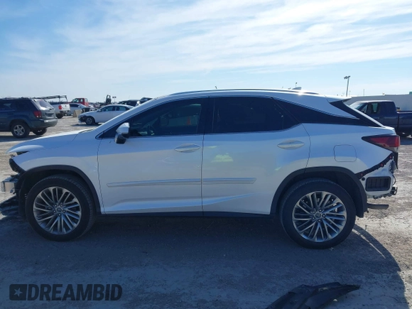 2020 Lexus RX with VIN 2T2JZMAA5LC165525, listed as a IAAI auction lot 41396533 with 67,440 mi miles. Bid and sale history available at carsss.com. Image 14.
