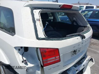 2013 Dodge Journey American Value with VIN 3C4PDCAB4DT503821, listed as a IAAI auction lot 42462848 with 109,902 mi miles and . Bid and sale history available at DreamBid. Image 13.