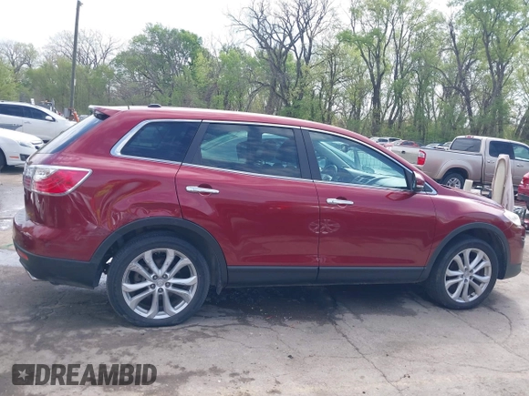 2011 Mazda CX-9 Grand Touring z VIN JM3TB2DA6B0310296, wystawiony jako IAAI lot #42022744 z przebiegiem 163 889 mil mil oraz . Historia ofert i sprzedaży dostępna na DreamBid. Obrazek 13.