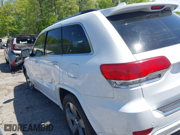2015 Jeep Grand Cherokee Overland with VIN 1C4RJECG6FC707458, listed as a IAAI auction lot 41996350 with 128,307 mi miles and . Bid and sale history available at DreamBid. Image 14.