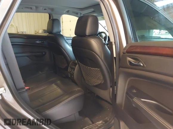 2015 Cadillac SRX Luxury Collection with VIN 3GYFNBE34FS575613, listed as a IAAI auction lot 41697251 with 173,117 mi miles and . Bid and sale history available at DreamBid. Image 8.