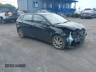 2014 Hyundai Accent SE with VIN KMHCU5AE6EU170822, listed as a IAAI auction lot 41591935 with 63,471 mi miles. Bid and sale history available at carsss.com. Image 1.