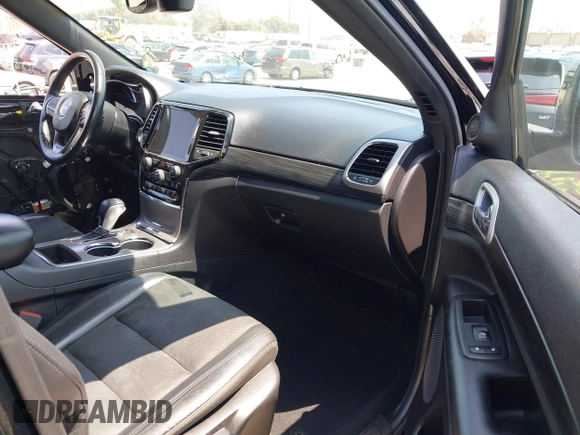 2019 Jeep Grand Cherokee Laredo z VIN 1C4RJEAG7KC858239, wystawiony jako IAAI lot #42587403 z przebiegiem 41 879 mil mil oraz . Historia ofert i sprzedaży dostępna na DreamBid. Obrazek 5.