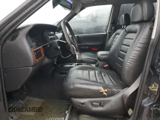 1998 Jeep Grand Cherokee with VIN 1J4FX48S1WC244308, listed as a Copart auction lot 74384714 with Not provided miles and Non repairable. Bid and sale history available at DreamBid. Image 7.