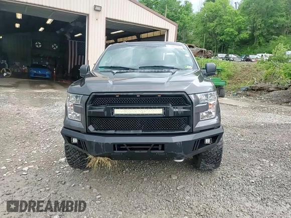 2015 Ford F-150 XLT with VIN 1FTFX1EG0FFD05618, listed as a Copart auction lot 61289795 with 91,836 mi miles and Salvage title. Bid and sale history available at DreamBid. Image 13.