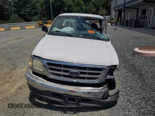 2002 Ford F-150 XL with VIN 1FTRF17282NB09380, listed as a Copart auction lot 62017964 with 0 mi miles and Salvage Title. Bid and sale history available at carsss.com. Image 5.