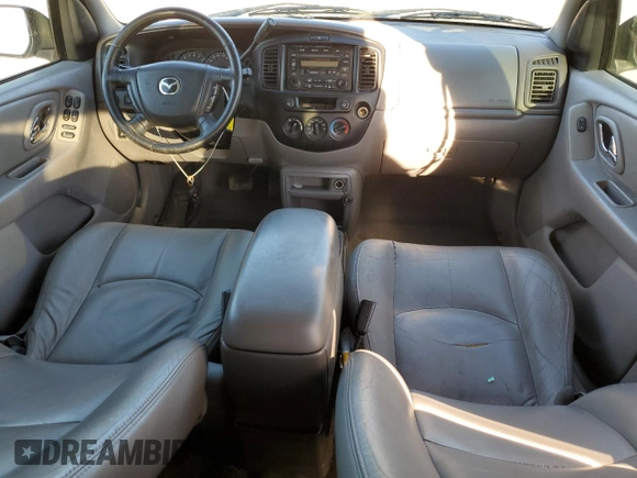 2001 Mazda Tribute LX with VIN 4F2CU08111KM20113, listed as a Copart auction lot 87681195 with 144,400 mi miles and Salvage Title. Bid and sale history available at DreamBid. Image 8.