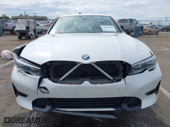 2021 BMW 3 Series 330i z VIN 3MW5R1J08M8C07261, wystawiony jako IAAI lot #41861814 z przebiegiem 87 426 mil mil oraz . Historia ofert i sprzedaży dostępna na DreamBid. Obrazek 12.