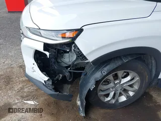 2019 Hyundai Santa Fe SE with VIN 5NMS2CAD2KH116731, listed as a IAAI auction lot 42689306 with 55,213 mi miles and . Bid and sale history available at DreamBid. Image 6.