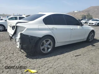 2015 BMW 3 Series 328i with VIN WBA3C1C51FP852887, listed as a Copart auction lot 58882695 with 146,823 mi miles and Salvage title. Bid and sale history available at DreamBid. Image 3.