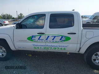 2014 Toyota Tacoma PreRunner with VIN 3TMJU4GN7EM158230, listed as a IAAI auction lot 40010521 with 145,185 mi miles. Bid and sale history available at carsss.com. Image 14.
