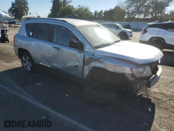 2013 Jeep Compass Sport with VIN 1C4NJCBB9DD258230, listed as a Copart auction lot 84009494 with 195,750 mi miles and Salvage Title. Bid and sale history available at carsss.com. Image 4.