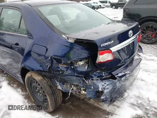 2013 Toyota Corolla L with VIN 5YFBU4EE6DP154457, listed as a IAAI auction lot 41674590 with 120,623 mi miles and . Bid and sale history available at DreamBid. Image 6.