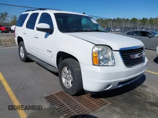 2010 GMC Yukon SLT with VIN 1GKUKCE02AR205309, listed as a IAAI auction lot 41825559 with 258,024 mi miles. Bid and sale history available at carsss.com. Image 1.