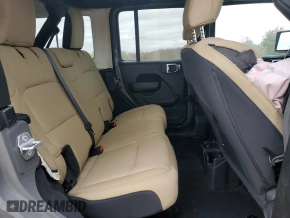 2022 Jeep Wrangler Unlimited Willys with VIN 1C4HJXDN7NW156538, listed as a Copart auction lot 79195464 with 87,081 mi miles and Salvage Title. Bid and sale history available at DreamBid. Image 11.