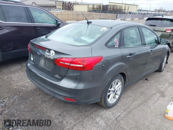 2016 Ford Focus SE with VIN 1FADP3F25GL378613, listed as a IAAI auction lot 41918553 with 98,349 mi miles. Bid and sale history available at carsss.com. Image 4.