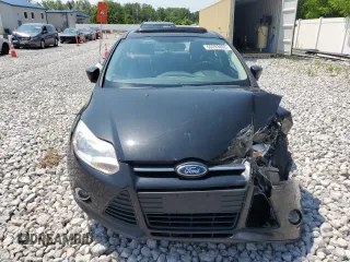 2012 Ford Focus SE z VIN 1FAHP3K22CL161005, wystawiony jako Copart lot #60203865 z przebiegiem 154 396 mil mil oraz Szkoda całkowita • Salvage title. Historia ofert i sprzedaży dostępna na DreamBid. Obrazek 5.
