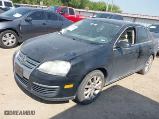 2010 Volkswagen Jetta Sedan Limited with VIN 3VWRX7AJ7AM007705, listed as a IAAI auction lot 41992944 with 148,306 mi miles. Bid and sale history available at carsss.com. Image 2.