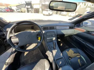 1995 Lexus SC 400 z VIN JT8UZ30CXS0041496, wystawiony jako Copart lot #80837114 z przebiegiem 62 010 mil mil oraz Tytuł czysty. Historia ofert i sprzedaży dostępna na DreamBid. Obrazek 9.