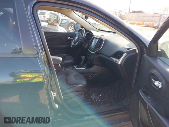 2014 Jeep Cherokee Trailhawk with VIN 1C4PJMBS5EW280598, listed as a IAAI auction lot 42079597 with 171,564 mi miles. Bid and sale history available at carsss.com. Image 5.